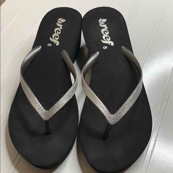 reef wedge flip flops silver